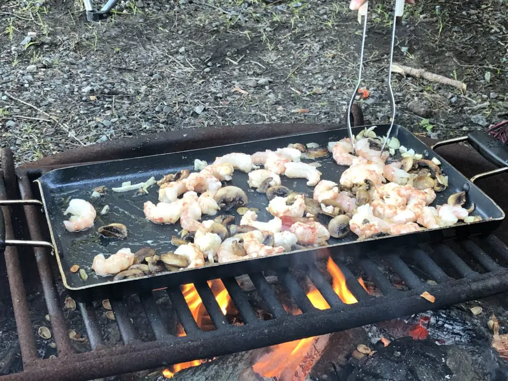 Shrimp cooked over a campfire