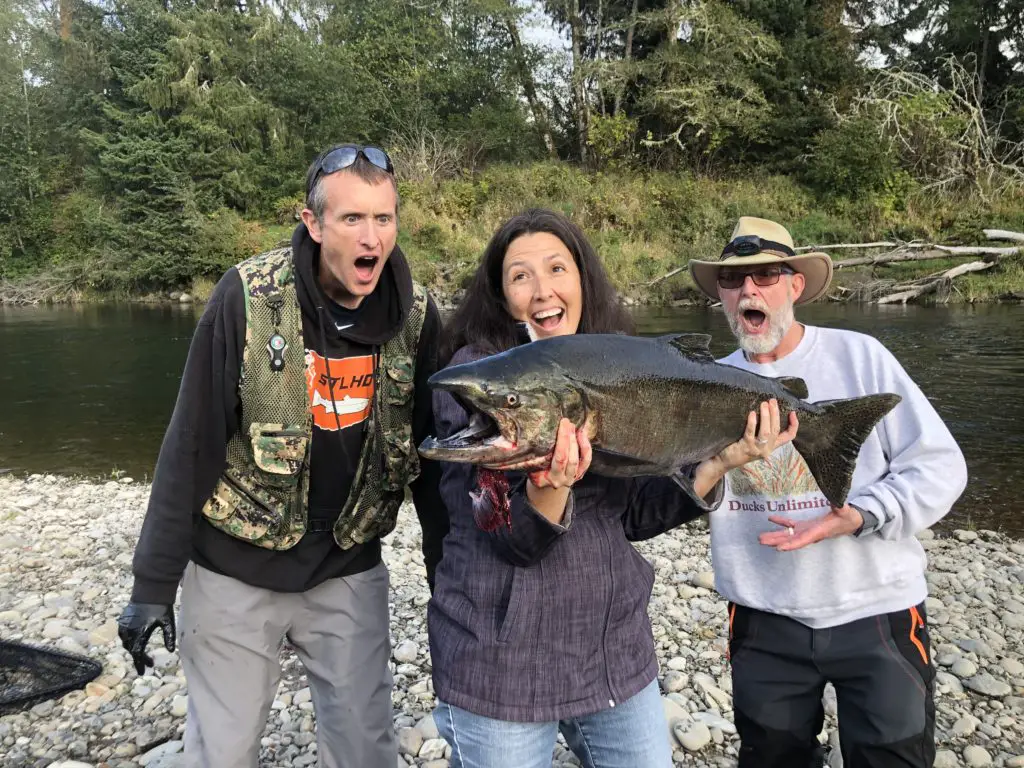 Big salmon pulled out of the river