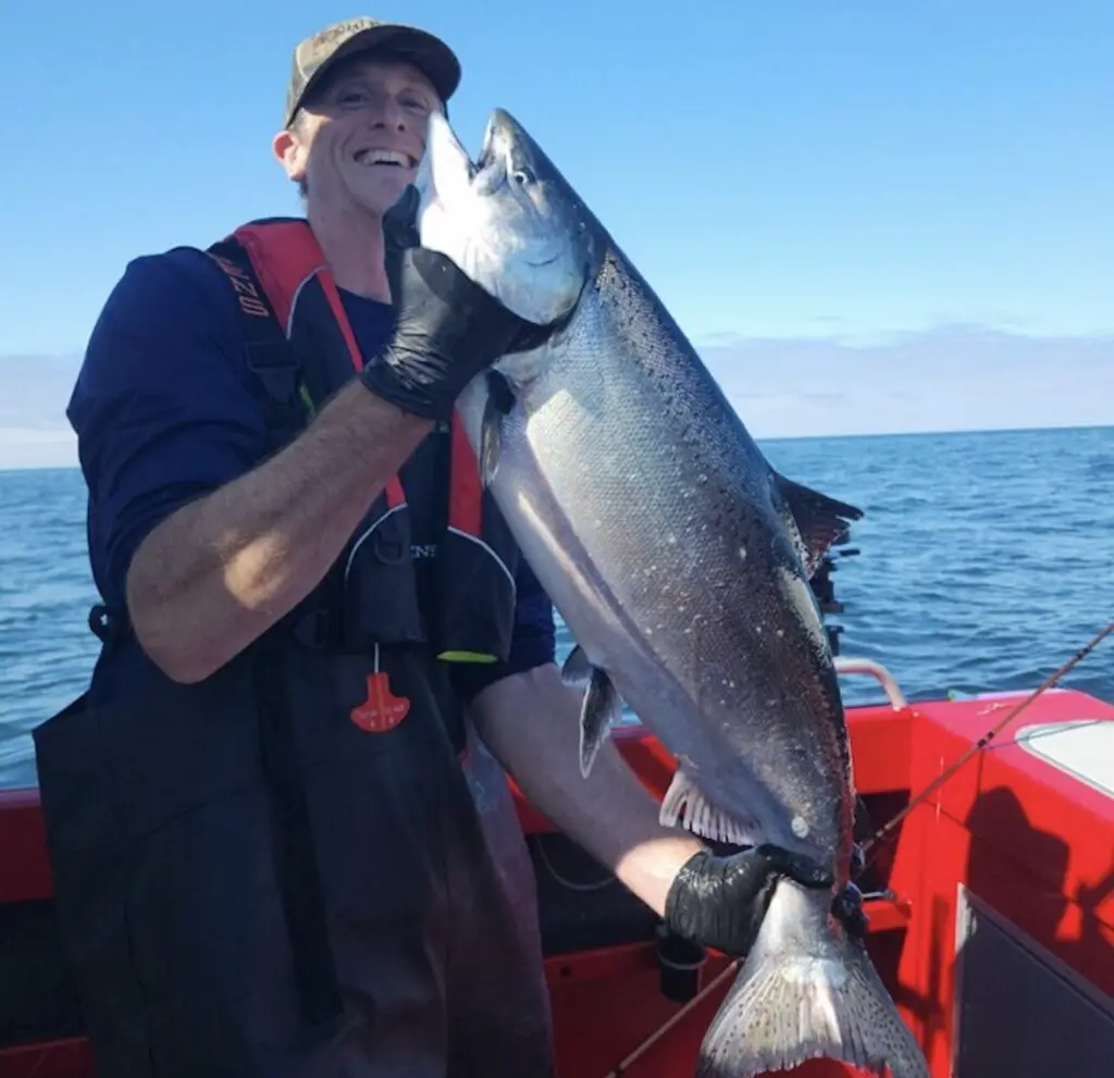 Holding a 17 lb westport chinook king salmon