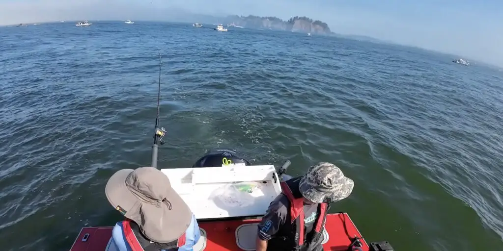 Fishing near buoy 10 with cliffs in background